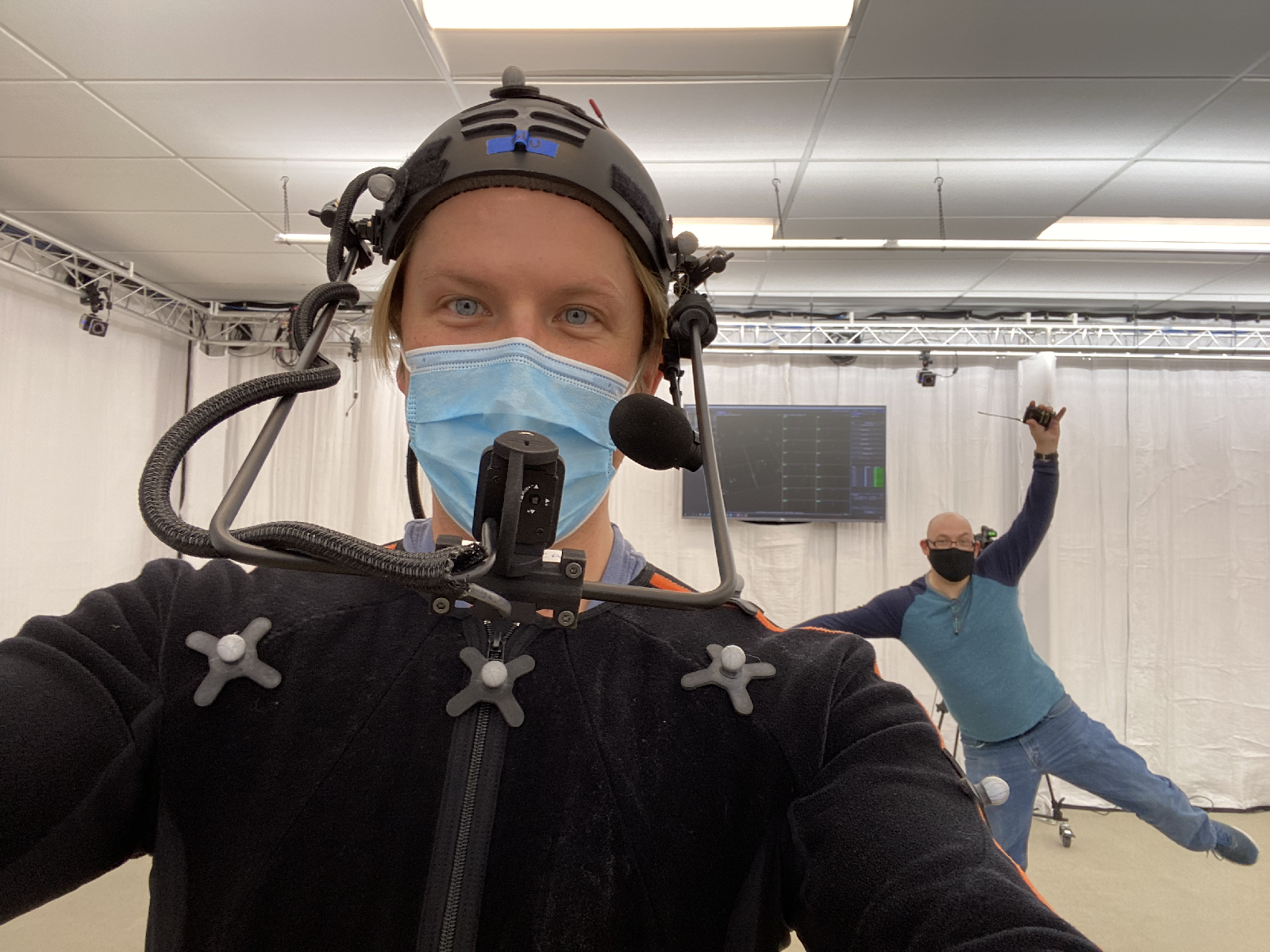 Zachary Andrews in mocap suit and head-mounted camera on the Deck Nine performance capture stage